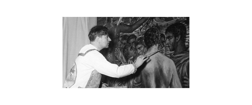 Gregorio Prieto en su estudio pintando El centro del mundo (hacia 1965)