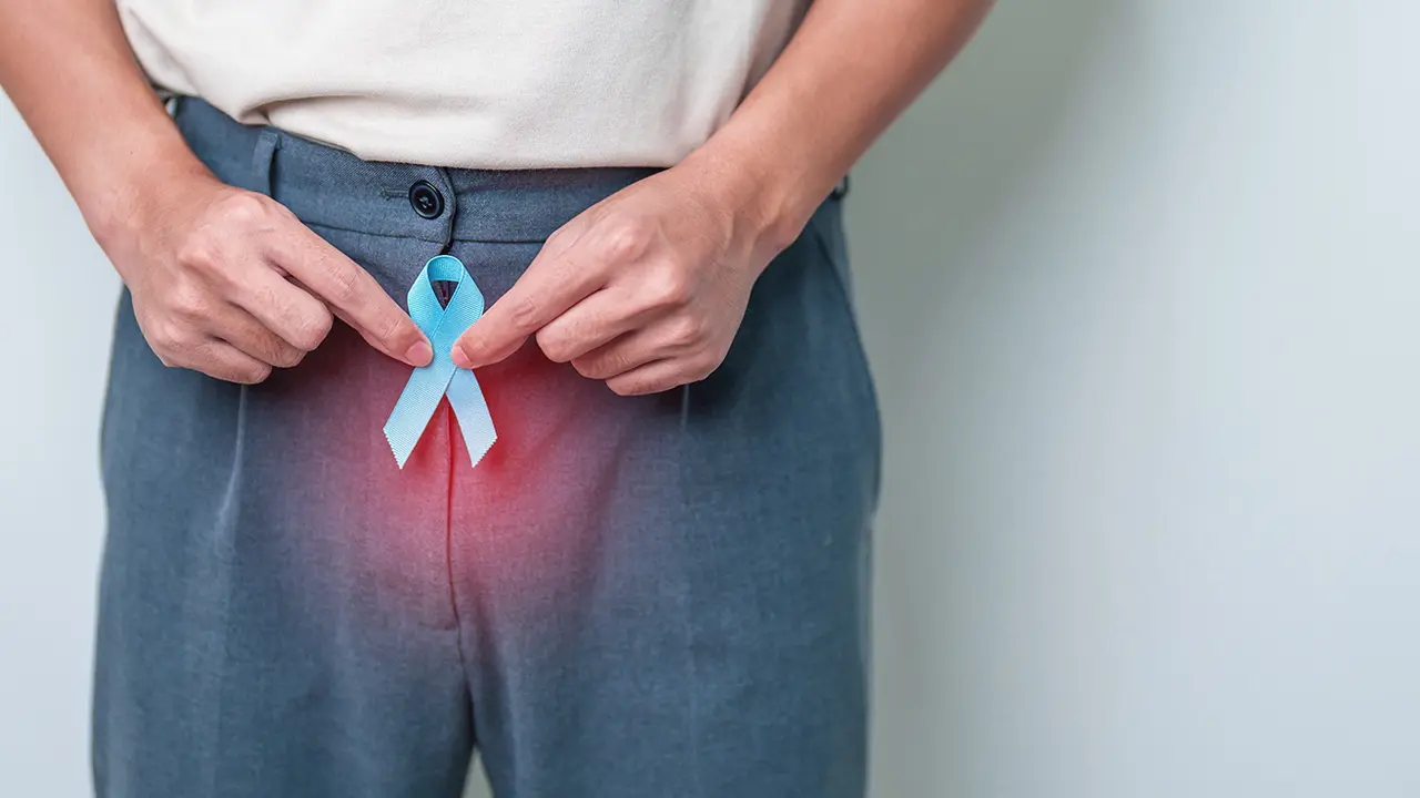 Blue November Prostate Cancer Awareness month, Man with Blue Ribbon on Prostate gland or Urinary bladder for support people life and illness. Healthcare, International men, Father and World cancer day