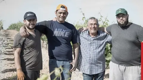 Fotografía temporeros, Cartel Campaña Temporeros 2022 Cáritas
