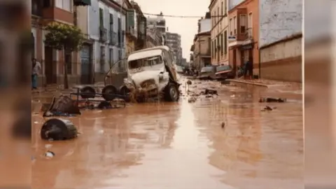 Calle Seis de Junio tras la riada del 79