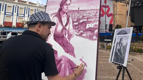 Chema del Fresno pintando en la plaza de España hoy sábado 6 de septiembre